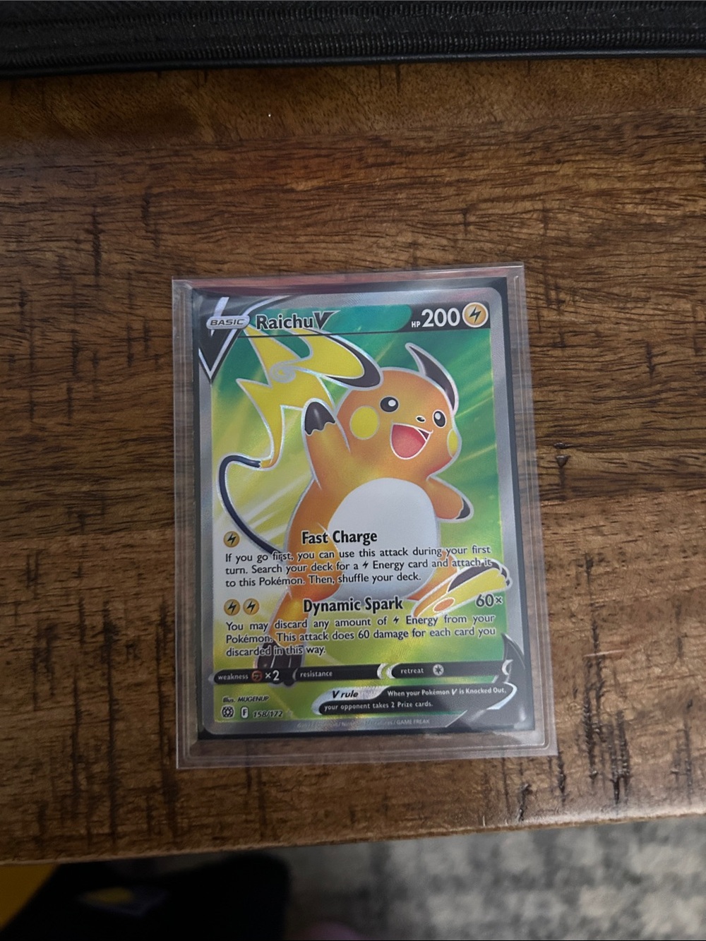 Pokemon Raichu V Holographic Card Yellow & Green Artwork